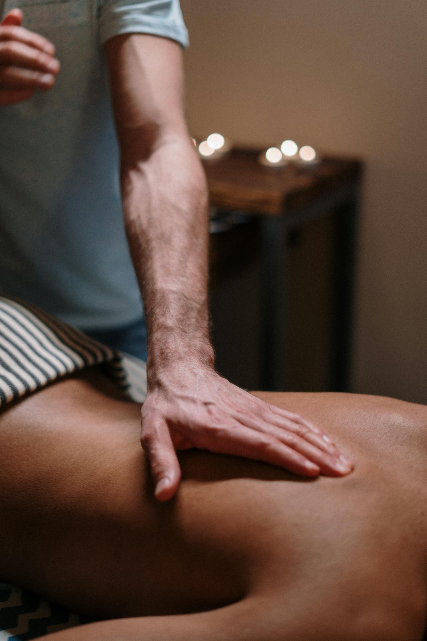 Soothing massage therapy focusing on relaxation and wellbeing in a calm spa setting.